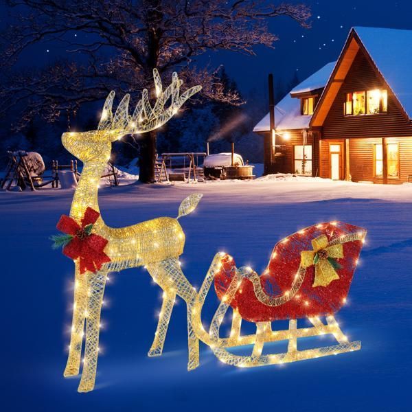 Elk Christmas Mercantile piece – golden deer design with sturdy iron, cotton thread detail, and a touch of green for festive courtyard decor